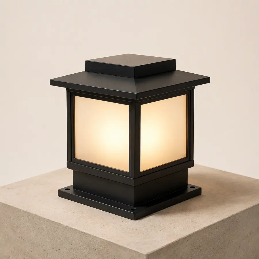 Unbranded black outdoor gate pillar light with frosted panels and warm illumination